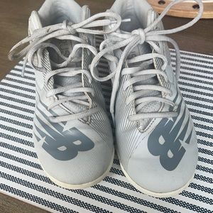 New Balance Rush Cleats